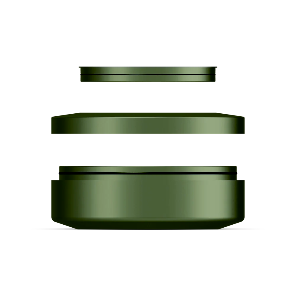 Green nicotine pouch metal travel container, showing three parts of the can